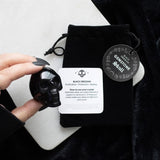Handcrafted Black Obsidian Crystal Skull, 4x5x2 cm, offering protection and elegance as a unique decor piece or talisman.