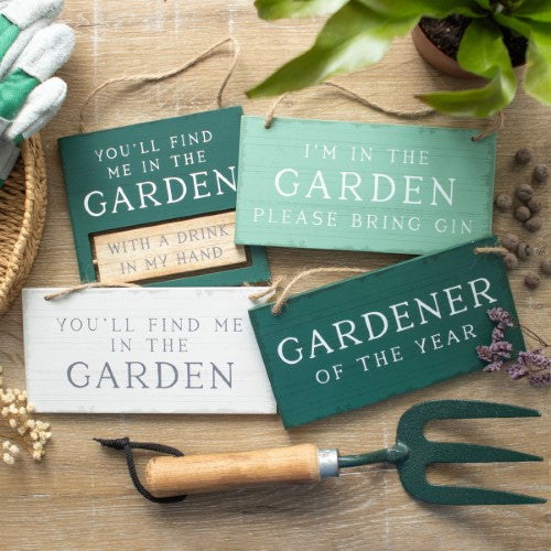 Whimsical garden sign reading "I'm in the Garden Please Bring Gin," perfect for outdoor decor and entertaining.