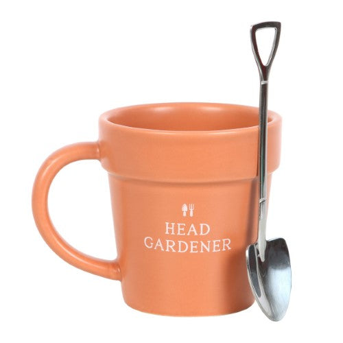Charming ceramic plant pot mug with mini shovel spoon, perfect for gardening enthusiasts, featuring 'Head Gardener' phrase.