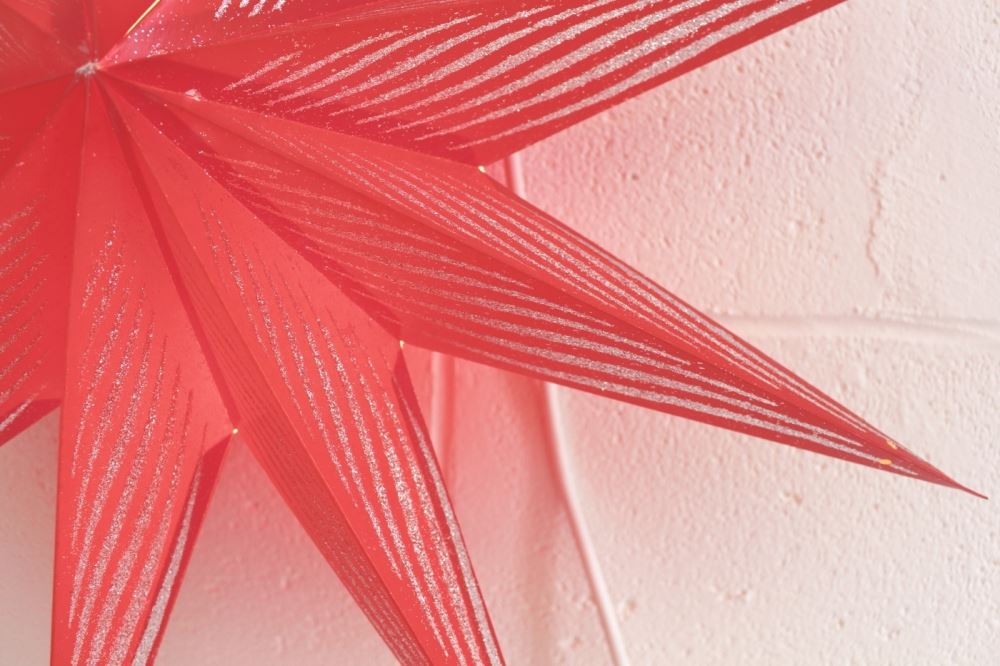 Elegant 60cm red star lantern lamp shade made from thick patterned paper, perfect for festive decor and delightful gifts.