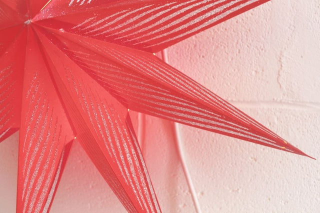 Elegant 60cm red star lantern lamp shade made from thick patterned paper, perfect for festive decor and delightful gifts.