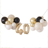 Elegant black and gold balloon bunting for a stylish 40th birthday celebration, perfect for indoor and outdoor decor.