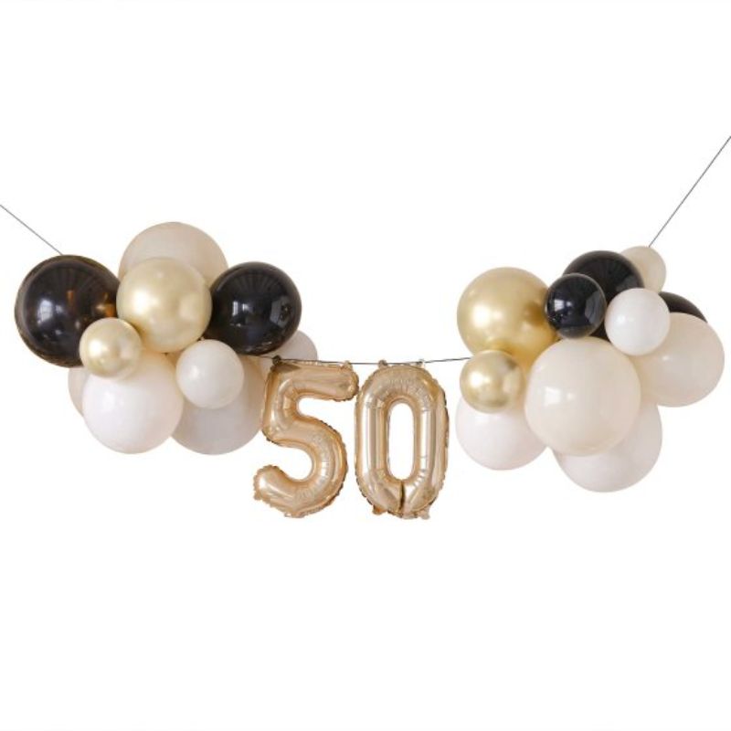 Elegant champagne noir balloon bunting decoration for 50th birthday celebrations, perfect for indoor and outdoor parties.