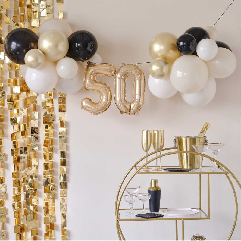 Elegant Champagne Noir balloon bunting decoration for 50th birthday celebrations, perfect for any festive gathering.