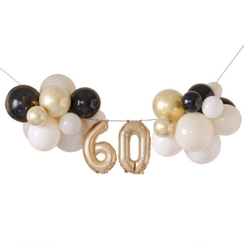 Elegant black and gold balloon bunting for a chic 60th birthday celebration, perfect for stylish decor and photo backdrops.