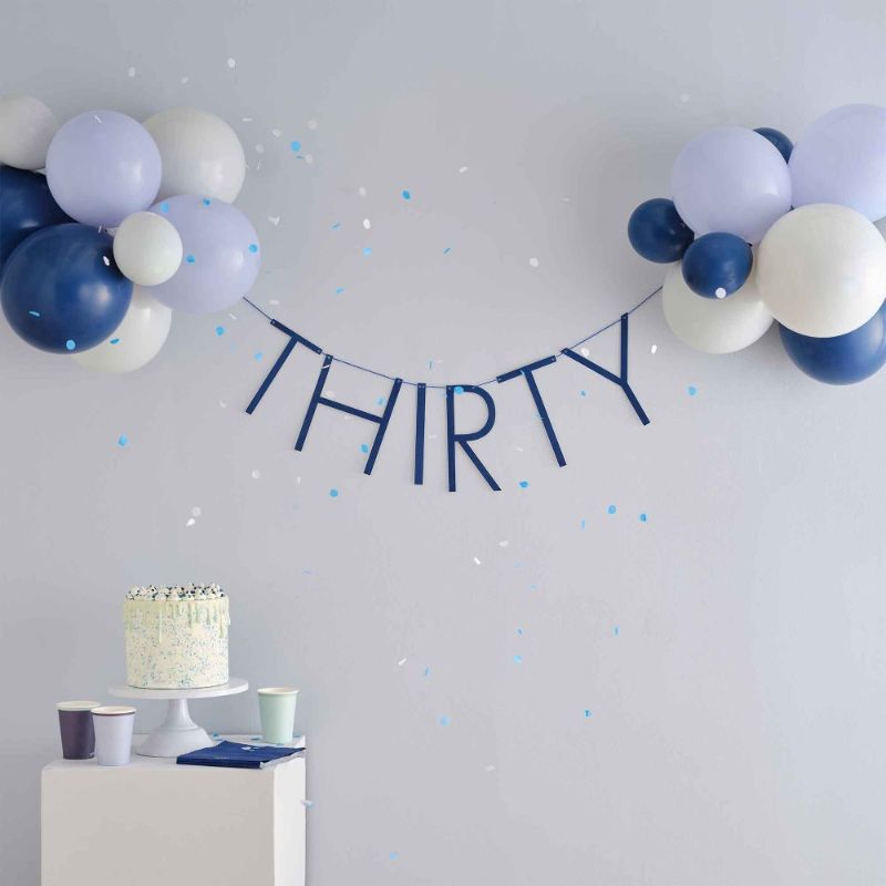 Elegant navy and gold balloon bunting for 30th birthday celebrations, perfect for indoor and outdoor festive decor.