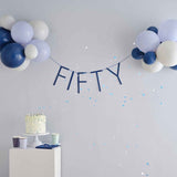 Navy balloon bunting for a stylish 50th birthday celebration, perfect for photo backdrops and festive décor.