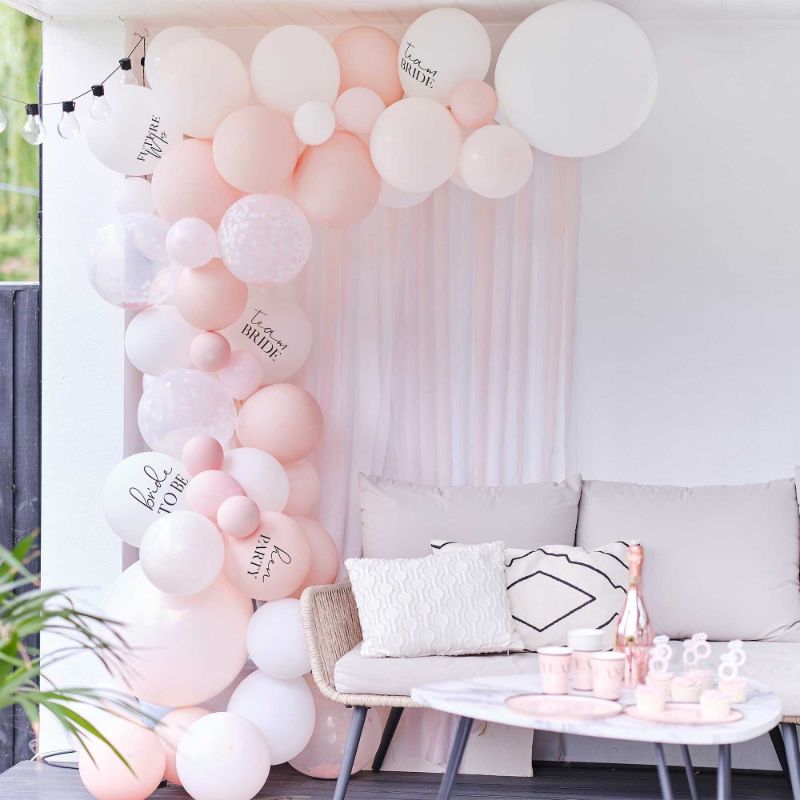 Future Mrs balloon arch kit featuring white, pink, and confetti balloons for stylish hen party decorations.