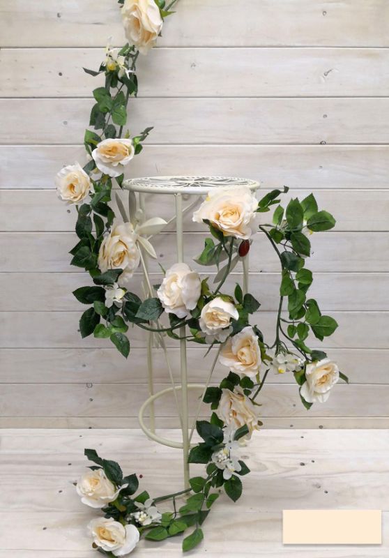 Artificial rose garland with berries in vibrant red, measuring 1.8m, perfect for year-round home decor or events.
