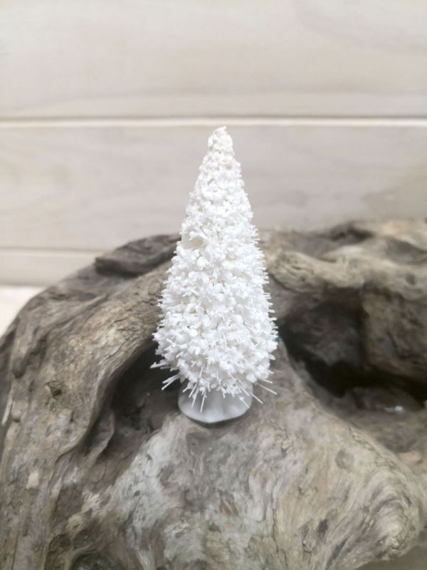Mini snowy white artificial tree (10cm) for festive decor, perfect for mantels, tabletops, and Christmas displays.