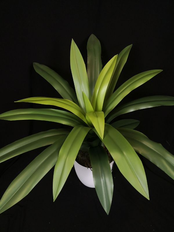 Artificial Leaf Orchid Cymbidium Bush with vibrant petals and green leaves, ideal for home and event decor without maintenance.