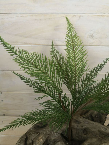 Lifelike artificial cedar bush with soft texture, perfect for low-maintenance home decor, indoor or outdoor use.
