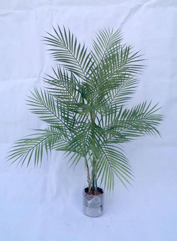 Lifelike 1.2m Artificial Areca Palm with vibrant fronds, perfect for adding tropical elegance to any indoor space.