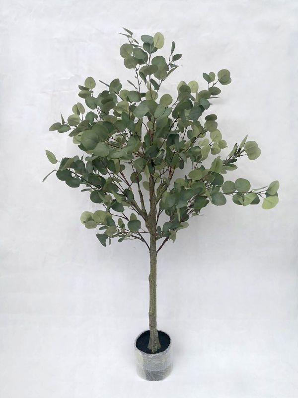 Lifelike 1.5m artificial eucalyptus tree in stylish pot, perfect for enhancing indoor spaces with low-maintenance greenery.