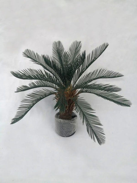 Stylish 0.65m artificial iron tree in pot, perfect for home or office decor with a maintenance-free, realistic design.