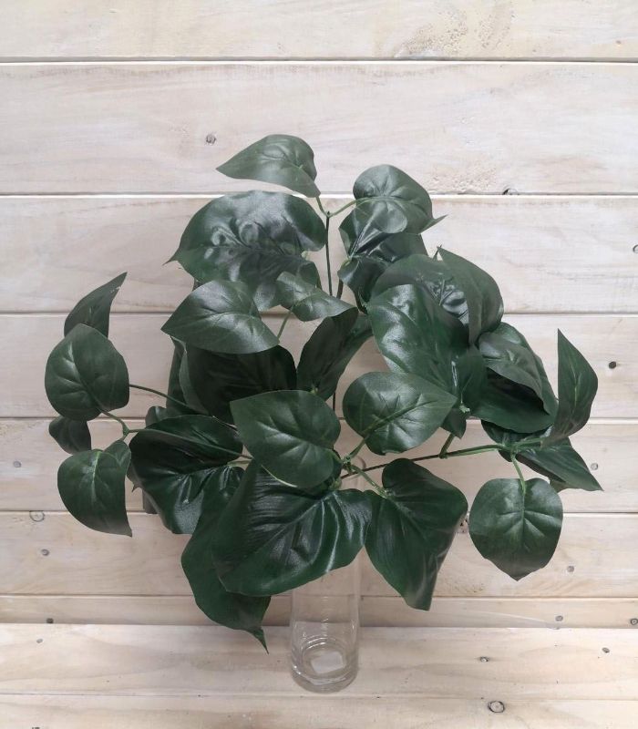 Lush rich green artificial philodendron bush, perfect for enhancing decor with low maintenance and realistic foliage.