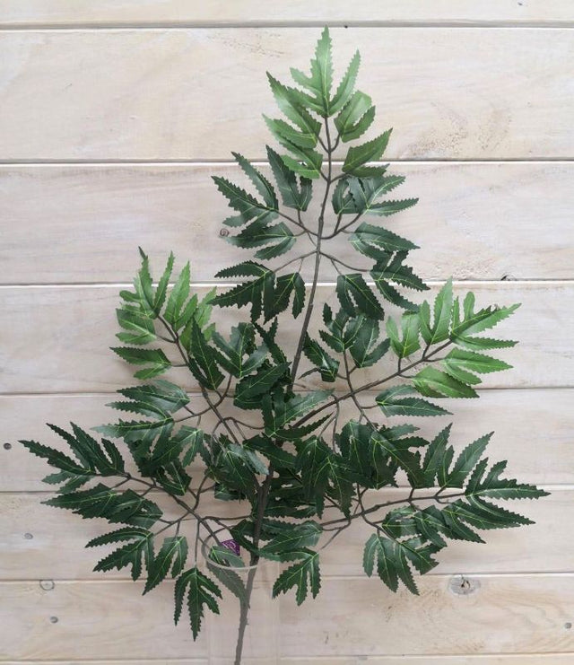 Lifelike Artificial Davallia Leaf Spray, perfect for adding elegant greenery to any decor without maintenance.