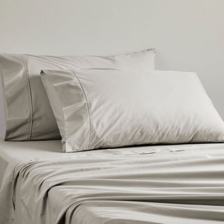 Logan & Mason Double Sheet Set in 300 TC Stone, crafted from breathable cotton with a crisp percale weave for comfort.