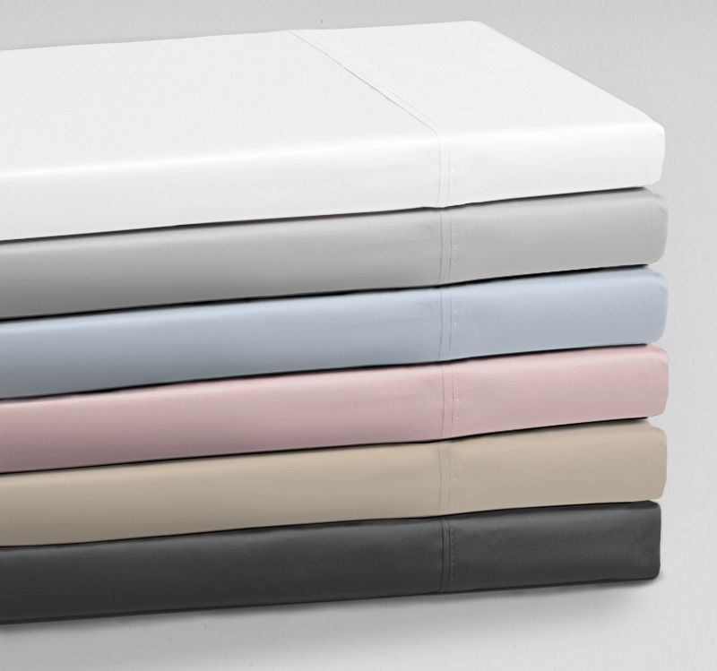 Queen Sheet Set in denim by Logan & Mason, crafted from breathable cotton with a crisp percale weave for comfort and style.