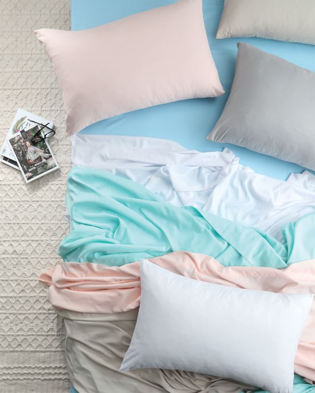 Queen sheet set in blush, crafted from soft 90gsm washed microfibre with deep fitted sheet, flat sheet, and pillowcases.