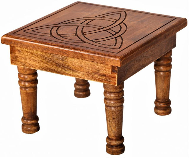 Handcrafted altar table in light mango wood featuring a Triquetra design, ideal for spiritual rituals and meditation.