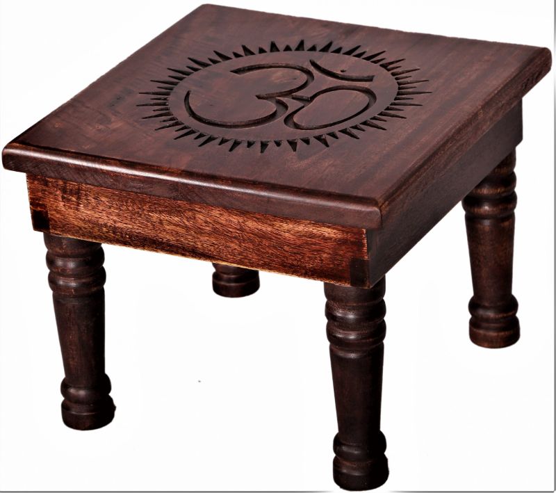 Handcrafted altar table in dark mango wood, featuring a hand-carved Ohm symbol, perfect for meditation and rituals.