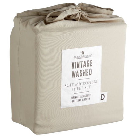 Luxurious king single sheet set in washed microfibre linen, featuring deep fitted sheets and matching drawstring bag for storage.