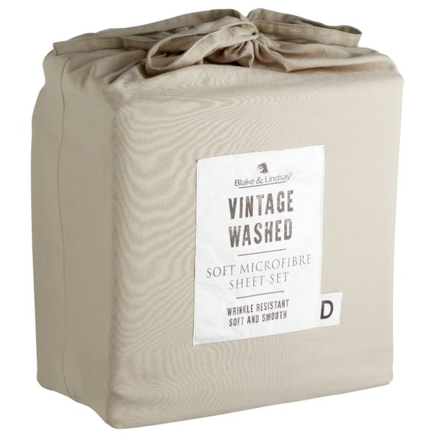 Luxurious king single sheet set in washed microfibre linen, featuring deep fitted sheets and matching drawstring bag for storage.