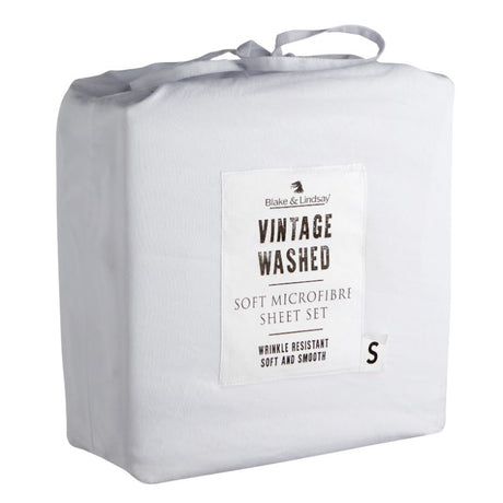 Soft white washed microfiber king single sheet set by Blake & Lindsay with elasticized fitted sheets and matching drawstring bag.