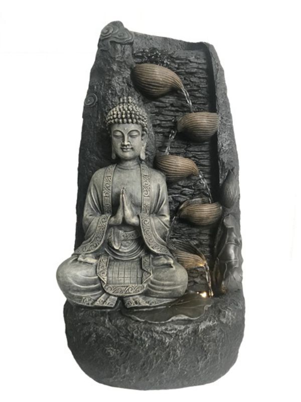 Outdoor water feature showcasing a Buddha design with clasped hands in a stone finish, perfect for tranquil gardens and patios.