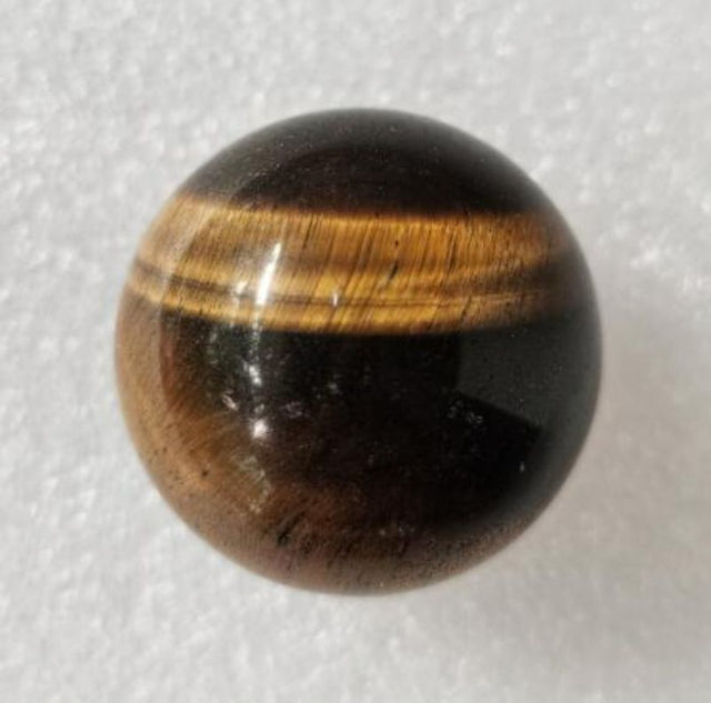 4cm Tiger Eye sphere with golden-brown hues, perfect for meditation, decoration, and enhancing confidence.