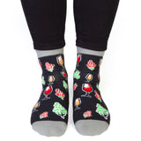 Socks featuring wine glasses and grapes, with 'WINE TIME' on the bottom; cozy, stylish, and one size fits all.