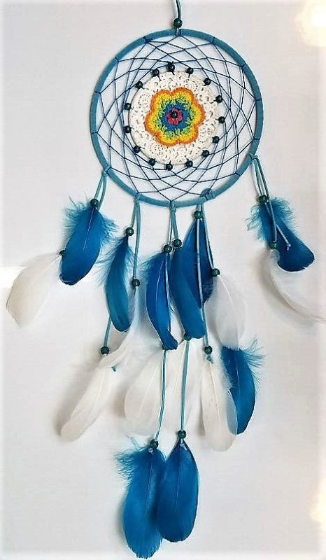Handcrafted blue dreamcatcher (20cm) with intricate webbing and feathers, perfect for home decor and filtering nightmares.