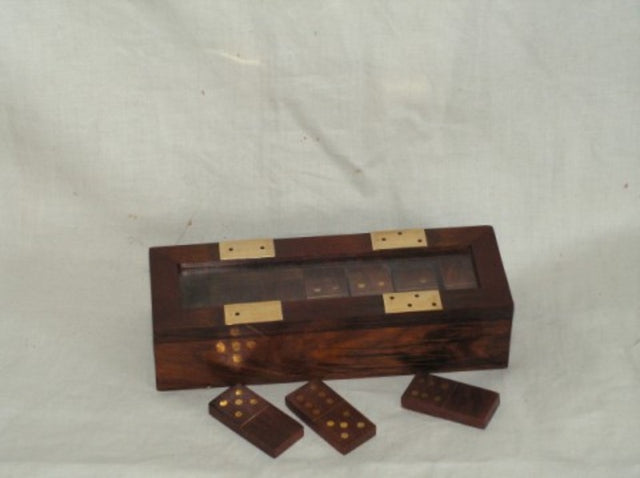 Elegant Indian brass dominoes in a glass top box, featuring intricate designs for classic game nights and stylish home decor.
