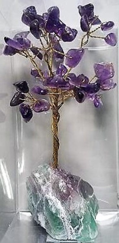 Large amethyst gemstone tree on a crystal base, symbolizing growth and positive energy, perfect for home decor and wellness.