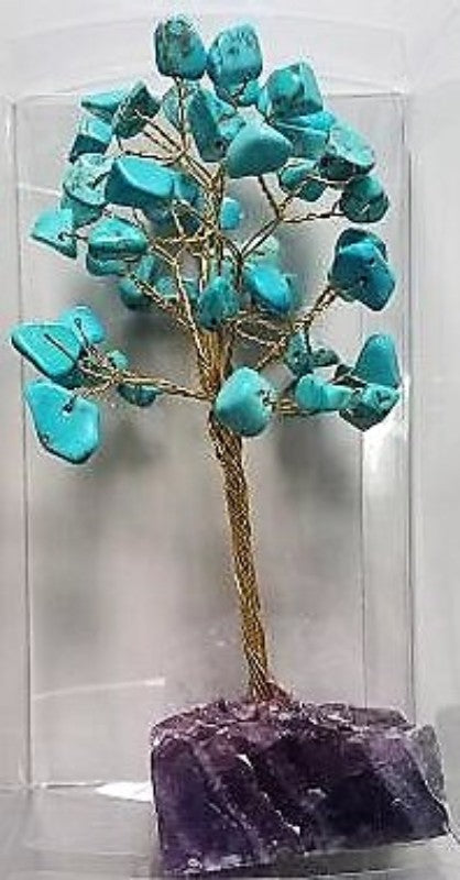 Turquoise gemstone tree with a crystal base, 10 cm tall, promoting serenity and elegance in home decor.