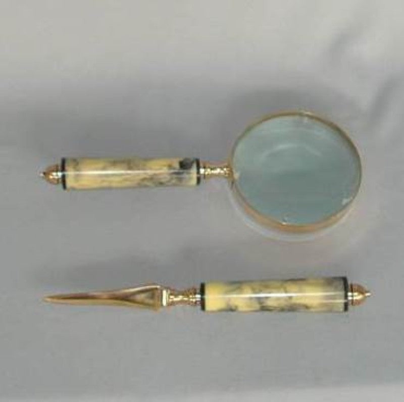 Elegant two-piece set featuring a marble look magnifier and Indian brass knife for precise culinary tasks and stylish decor.