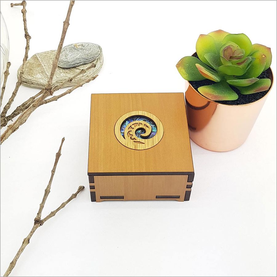 Small trinket box featuring Koru design and vibrant NZ Paua inlay, perfect for storing jewelry and small treasures.