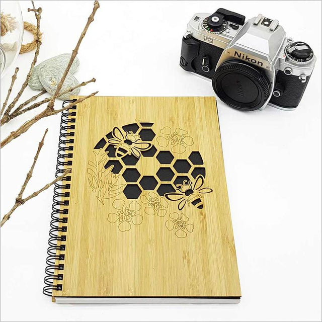 Small bamboo journal with honeycomb design, 110 pages of cartridge paper, eco-friendly and perfect for various creative uses.