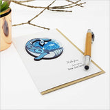 Whale-themed greeting card with embellishments, crafted from textured 250gsm card, ideal for special occasions.