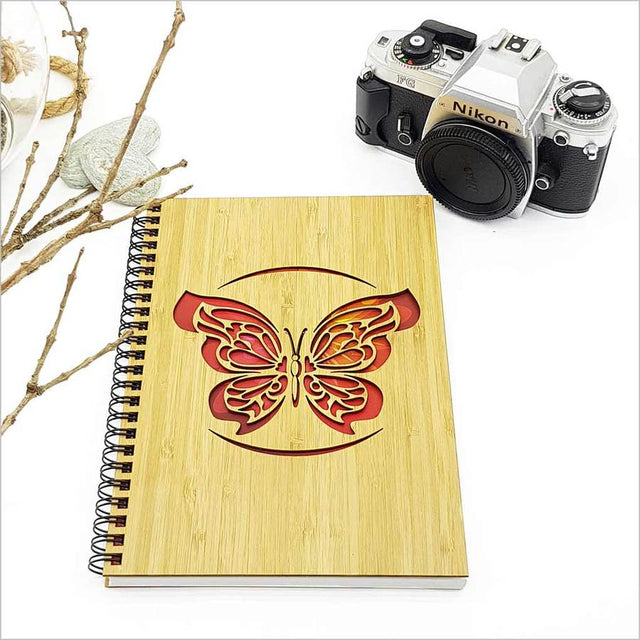 Small Bamboo Journal with butterfly design, FSC certified, 110 pages of 110gsm paper for writing and creativity.