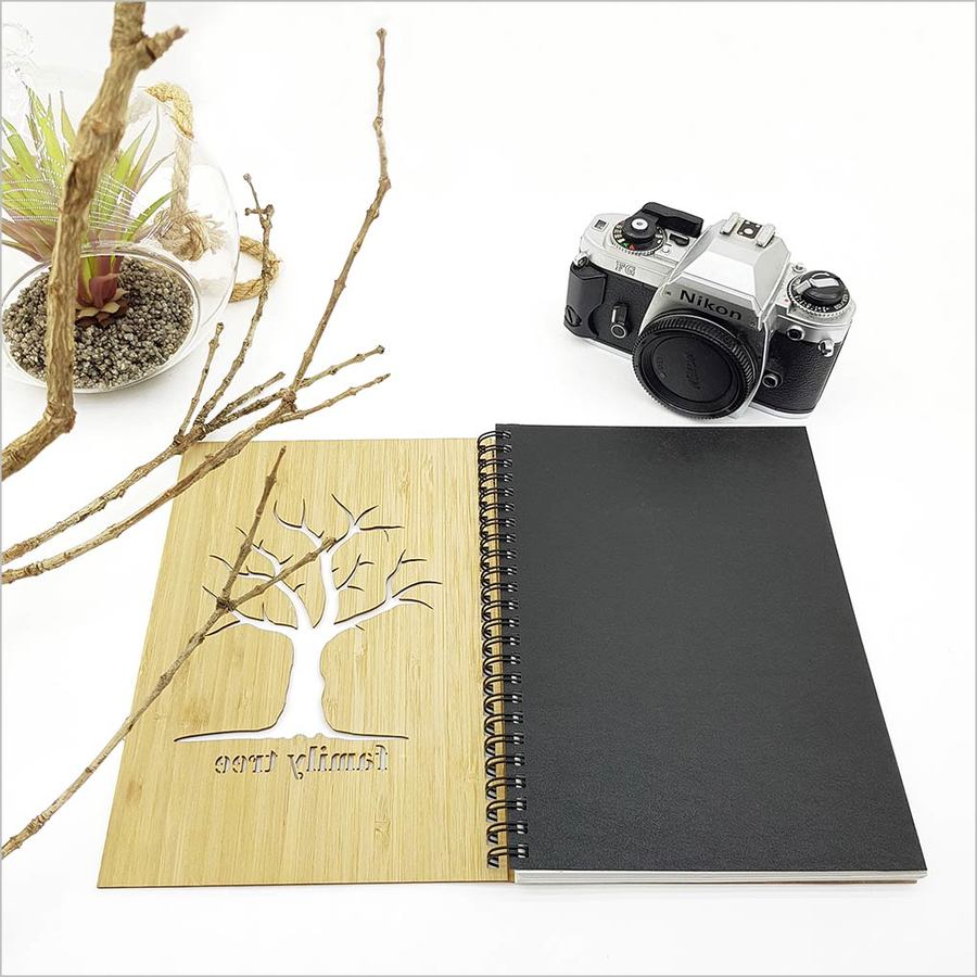 Small Bamboo Journal showcasing a family tree design, eco-friendly, 110 pages, perfect for preserving memories and journaling.