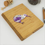 Bamboo Journal featuring a white floral kiwi design, eco-friendly, 175mm x 230mm with 120 pages of smooth writing paper.