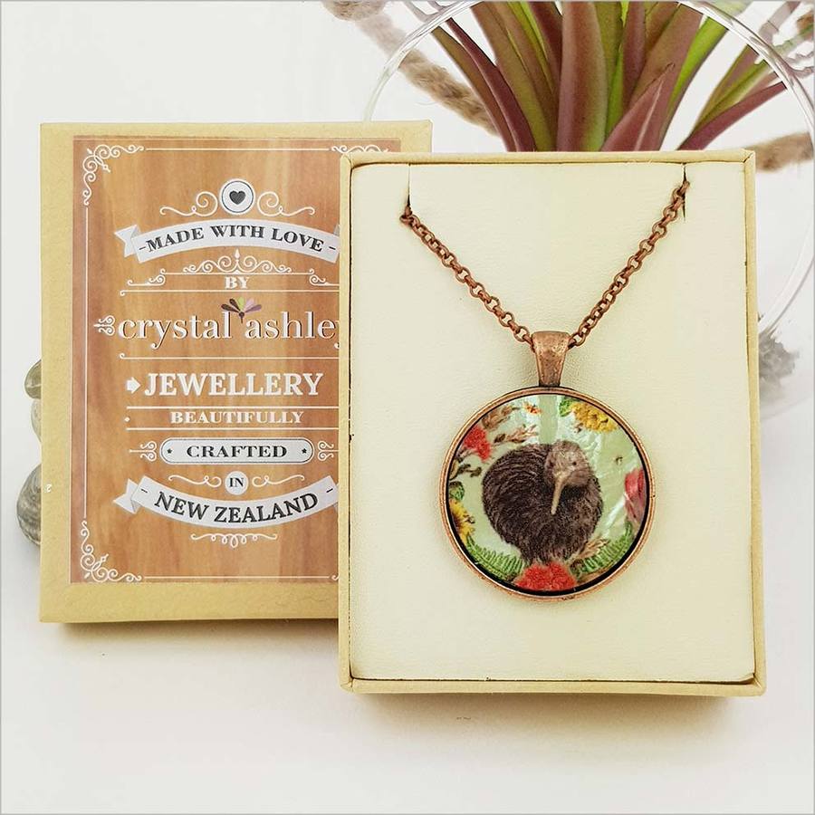 Floral kiwi design necklace in mother of pearl, 30mm pendant, antique copper finish, comes with 75cm chain and gift box.