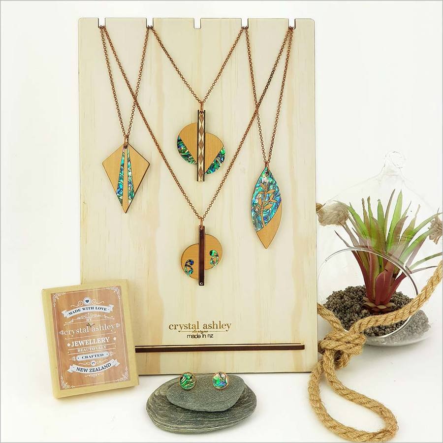 Rimu Necklace with Leaf design, featuring Paua inlay, crafted from eco-friendly wood, presented in a gift box.