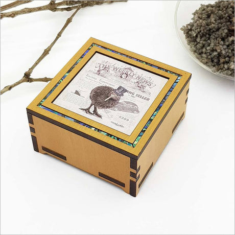 Elegant small trinket box featuring a vintage kiwi design, crafted from premium NZ veneer; perfect for home decor and storage.