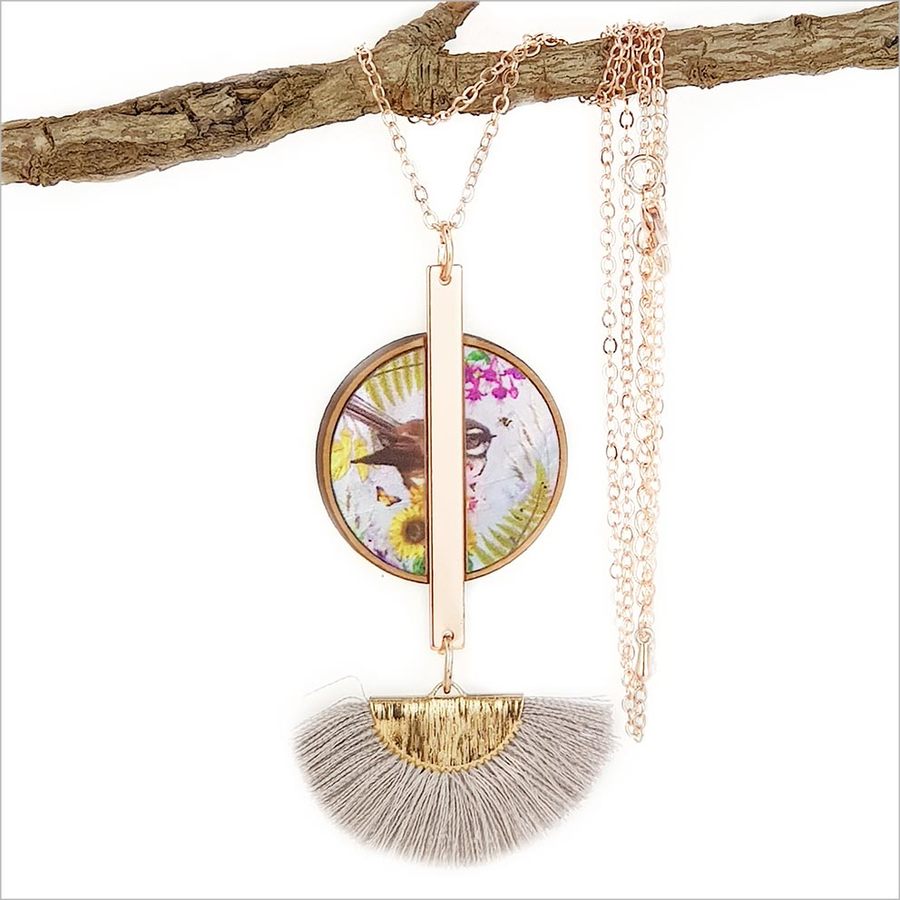 Tassel necklace featuring floral fantail design on mother of pearl with rose gold finish and 24" chain, elegantly gift boxed.