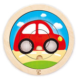 Wooden spinning transport puzzle for toddlers, featuring colorful vehicles and two difficulty levels to enhance cognitive skills.