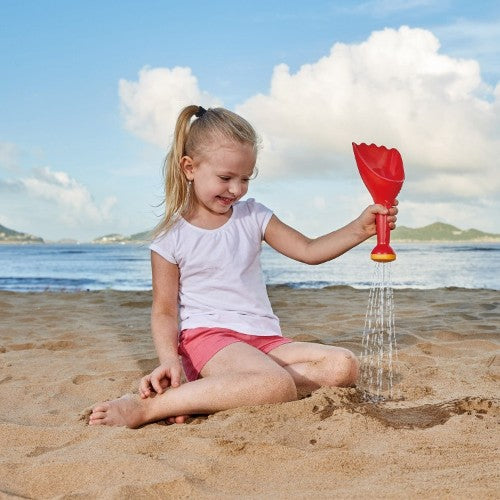 Vibrant blue Hape Rain Shovel for toddlers, designed for sand and water play to enhance creativity and motor skills.