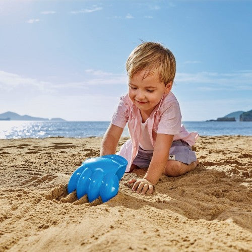 Bright blue Hape Power Paw Toy for kids 18+ months, perfect for outdoor sand play and imaginative adventures.